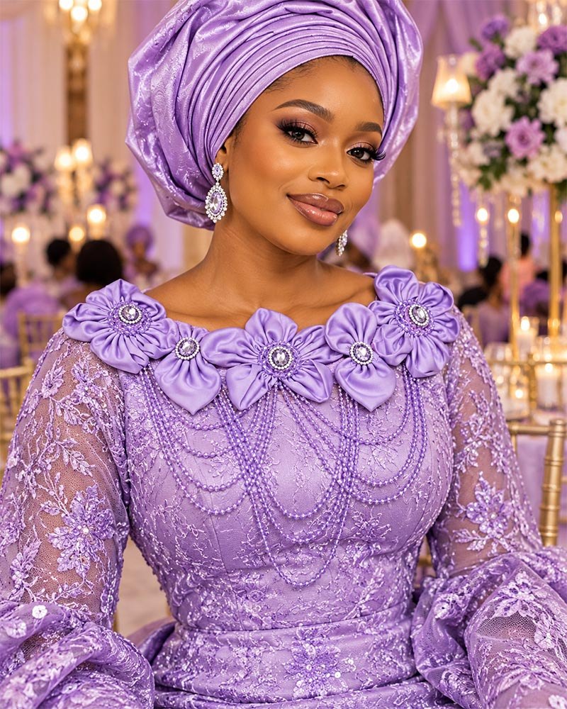 Lavender 3D satin flower beaded neckline applique on an aso ebi lace gown with matching gele for an African wedding party