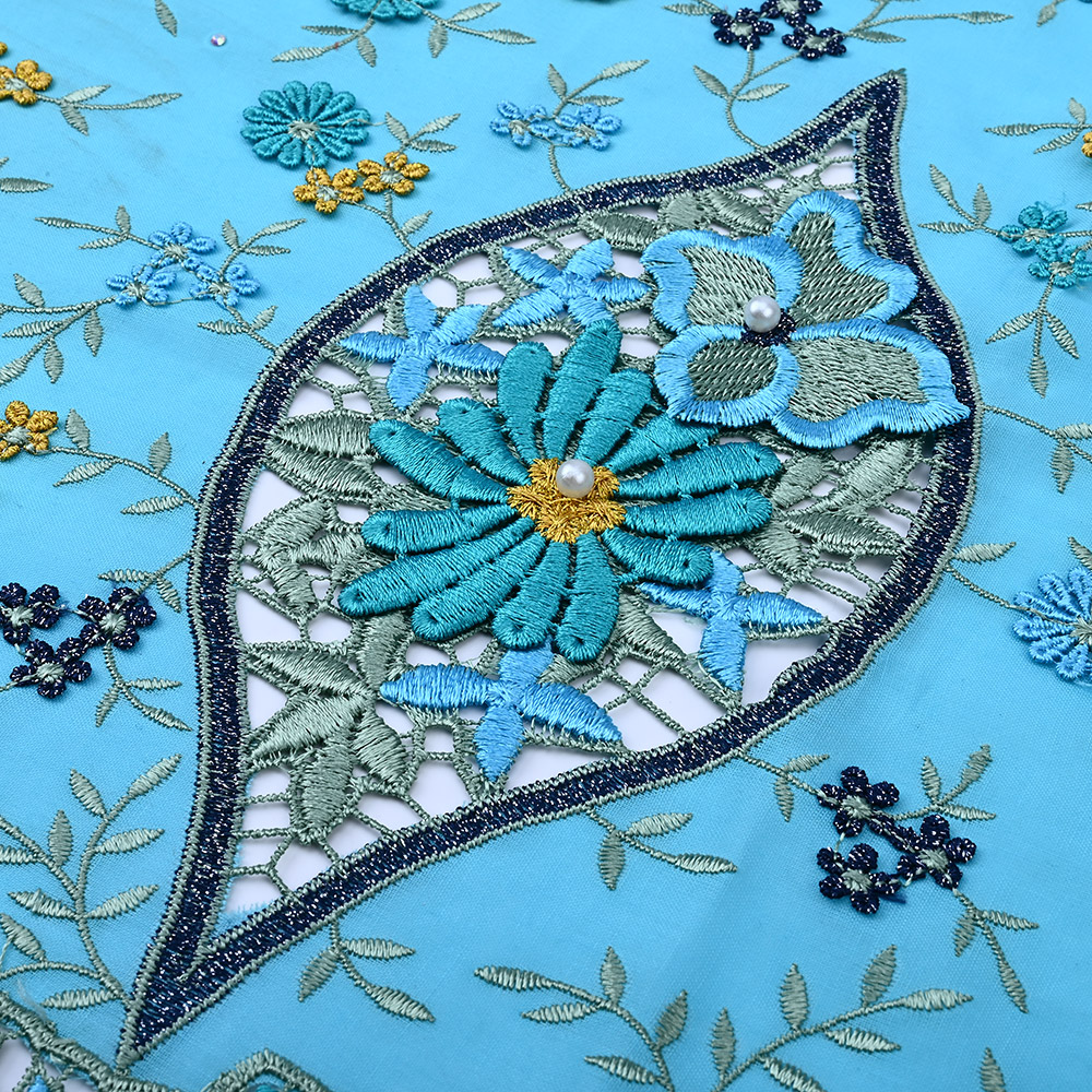 Almond cutwork medallion with pearl beads on turquoise 3D lace fabric