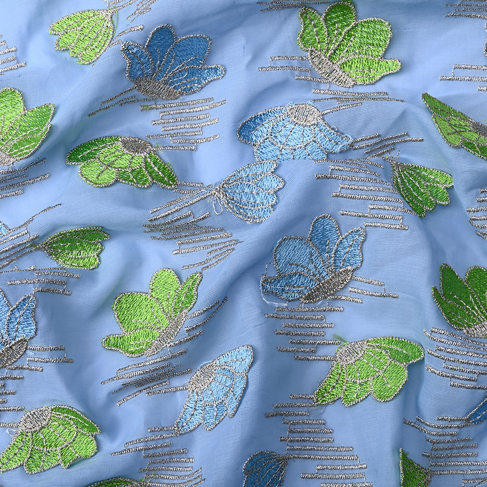Lime green and blue 3D leaf embroidery on sky blue lace fabric