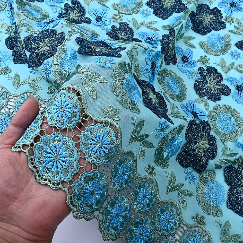 Medallion guipure border of aqua blue 3D lace fabric