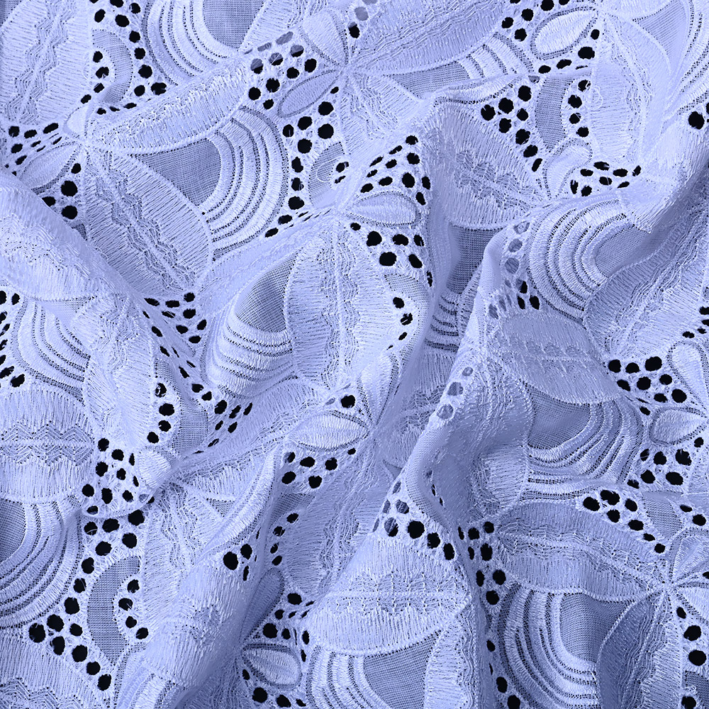 Leaf and eyelet cutwork on white Swiss voile lace fabric
