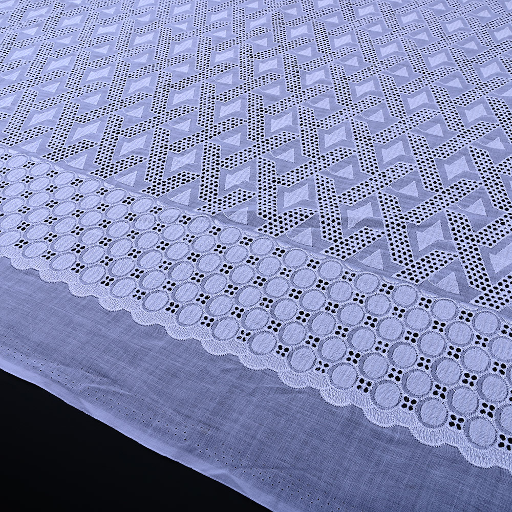 Circle eyelet scalloped border of white Swiss voile lace fabric